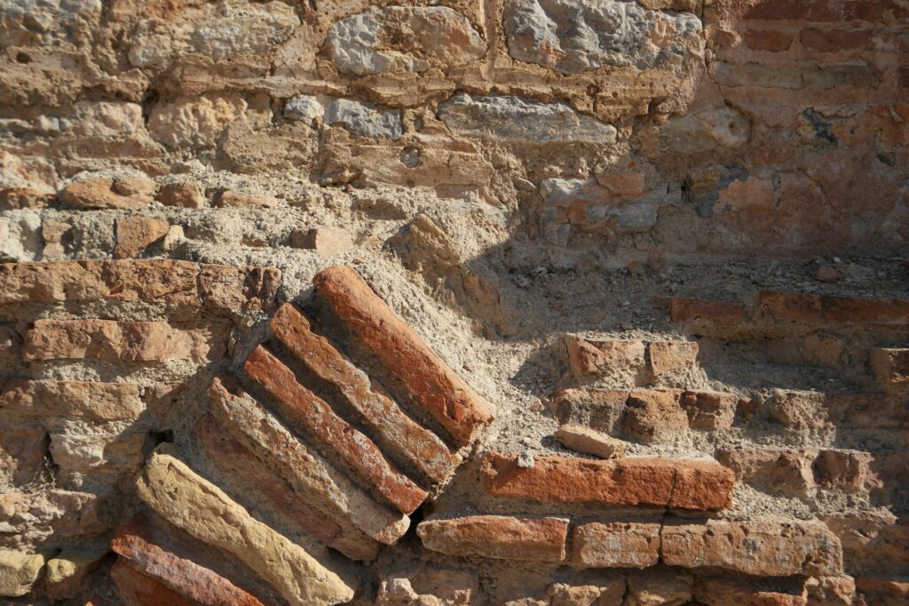 Ephesus ancient city ruins. Old brick wall.